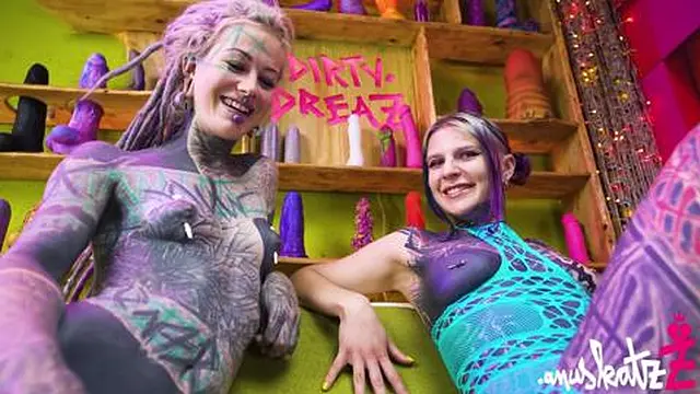 Two tattooed girls explore deep penetration with big toys – gaping &mdash;  teasing &mdash;  and genuine orgasms