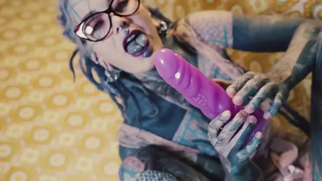 Spread wide as she lets it flow over books and playthings