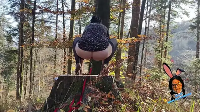 Big tit mom milf in a dress and heels spreads her legs, buttplug in her ass with a leash pissin